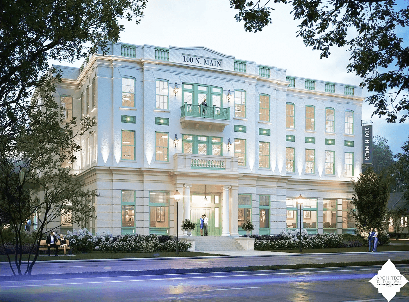 A three-story, white and green building with large windows is illuminated at dusk. The sign reads “100 N. Main,” marking the location of a full service law firm. Trees and benches are visible in the foreground.